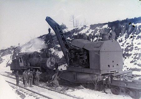 Wrecker lifting an engine